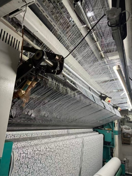high speed warp knitting machine