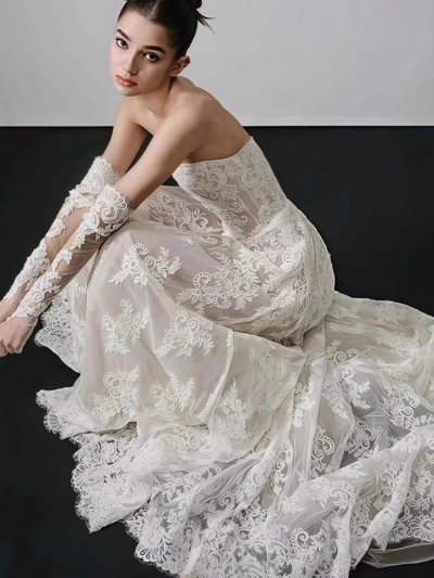 model wearing lace dress sitting pose