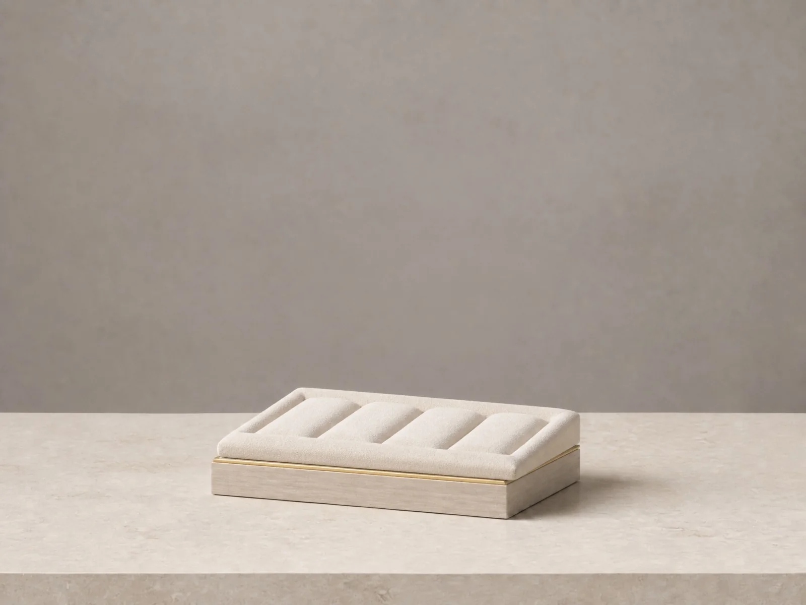 Jewelry display manufacturer series image two - the same ivory velvet base and gold line, with the top converted into a ring display tray holding four padded ring slots